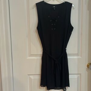 Black lined dress with sheer overlay and tie belt New without tags.Size XL